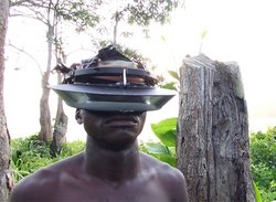 CATPC Member Jean Kawata carrying Upside Down glasses by Carsten Höller, videostill by Eléonore Hellio